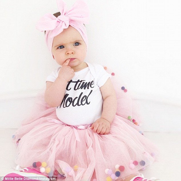 'Seriously.... She's just the funniest': Her mum said as Millie-Belle posed in a 'part time model' t-shirt