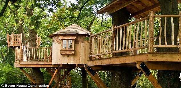 This bespoke circular children's playhouse is built in oaks and ashes and cost around £40,000