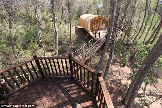 Spanish hideaway: This Iberian example has a 20ft slide and is part of a complex connected by rope bridges